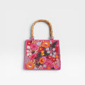 BOLSO FUCSIA FLORES CUENTAS- CUPLÉ
