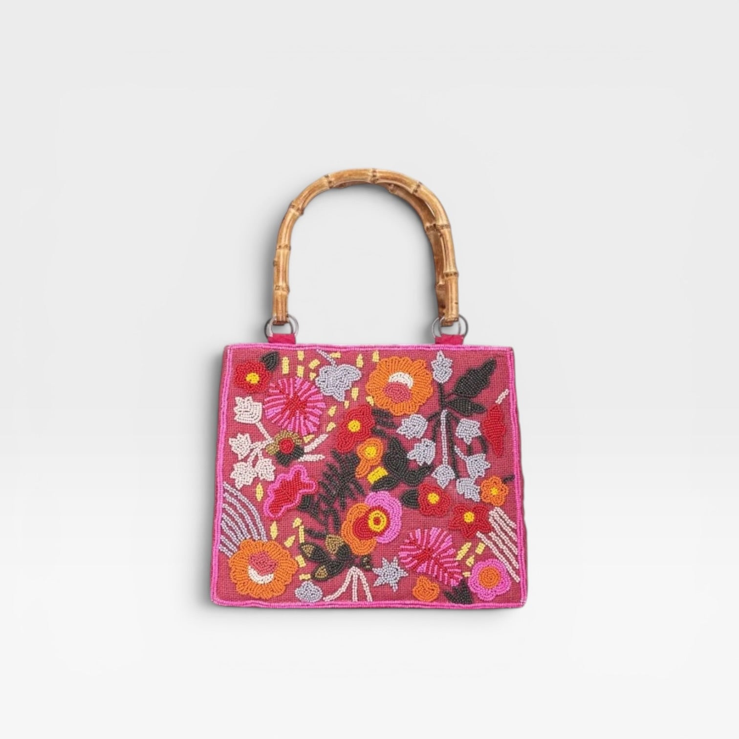 BOLSO FUCSIA FLORES CUENTAS- CUPLÉ