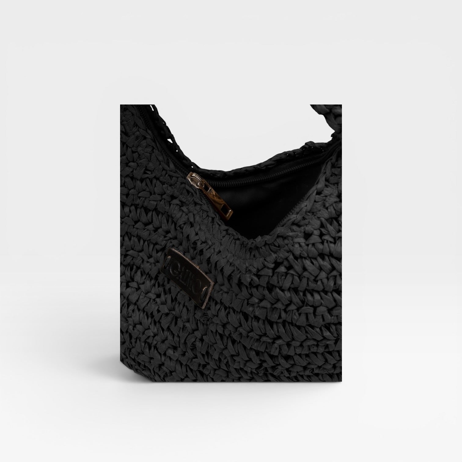 Bolso de mano redondo negro- Gaimo